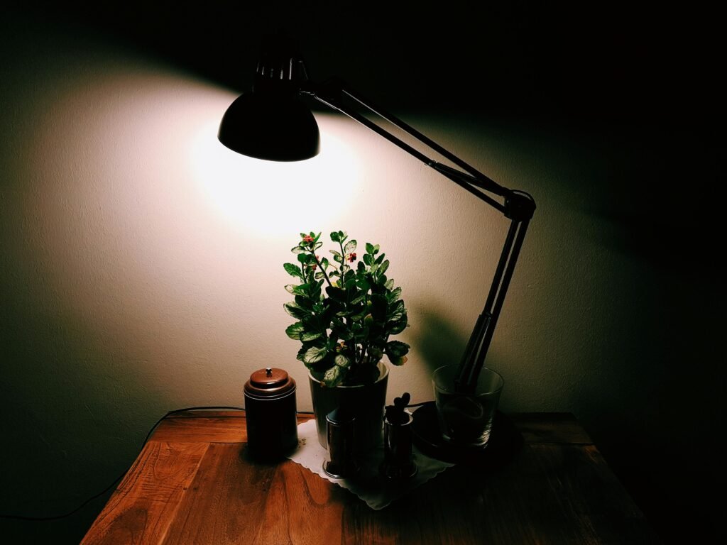 Minimalist black desk lamp on a white desk