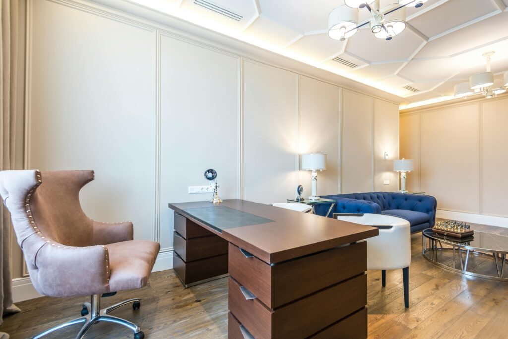 Stylish home office with luxury executive desk and decor